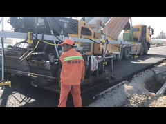 Siming Technology's non-contact ultrasonic balance beam is paired with a VOLVO asphalt paver for op